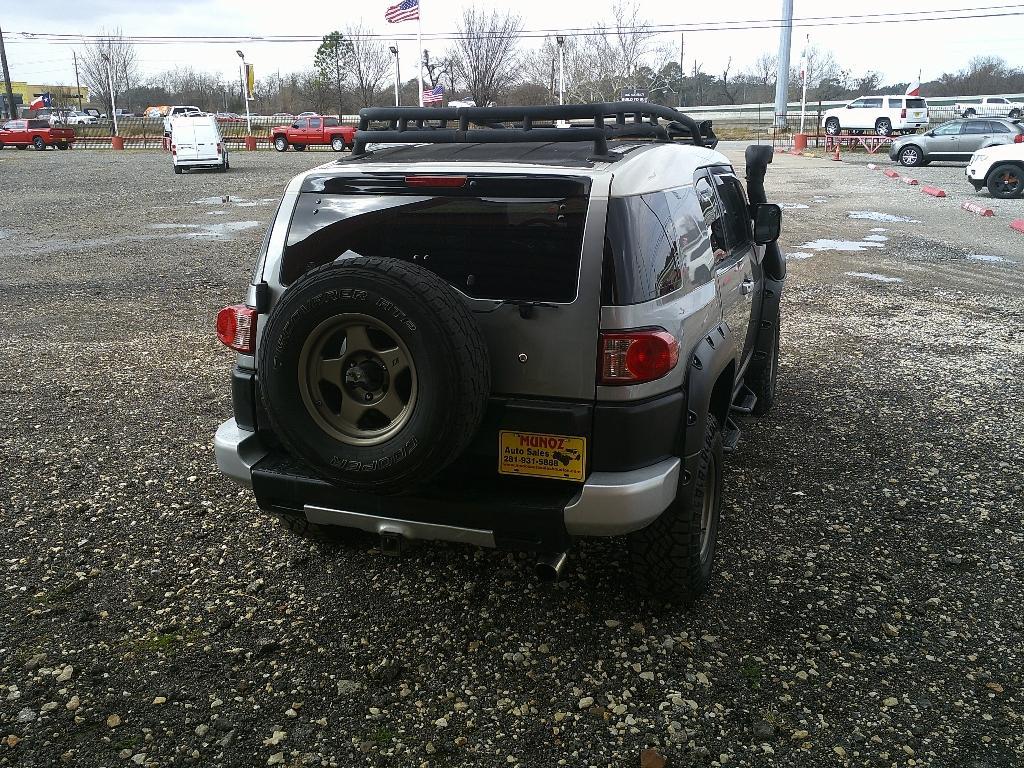 2010 SILVER TOYOTA FJ CRUISER 4WD AT (JTEBU4BFXAK) with an 4.0L V6 DOHC 24V engine, 5-SPEED AUTOMATIC transmission, located at 16660 North Freeway, Houston, TX, 77090, (281) 821-5000, 29.957193, -95.418587- Photo#1