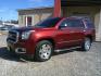 2017 MAROON GMC YUKON SLE 2WD (1GKS1AKC3HR) with an 5.3L V8 OHV 16V engine, 6-SPEED AUTOMATIC transmission, located at 16660 North Freeway, Houston, TX, 77090, (281) 821-5000, 29.957193, -95.418587- Photo#2